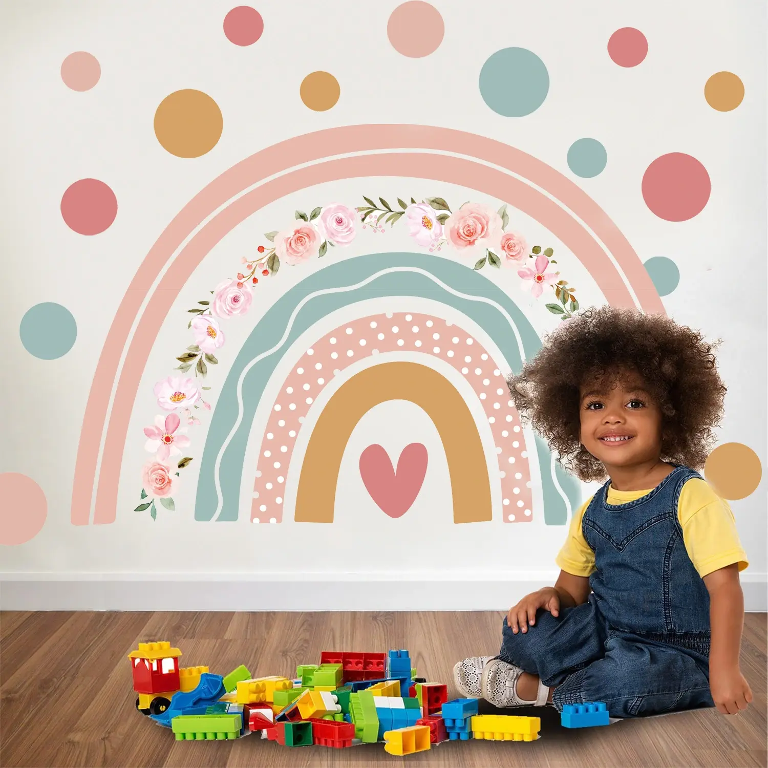 This 35.4 x 24 inch (90 x 61 cm) boho rainbow wall decal adds joyful color and whimsy to any children's space. Made with repositionable, residue-free vinyl for safe, mess-free decorating. From ononswitch. Boho rainbow wall decal for kids room decor, removable mural sticker